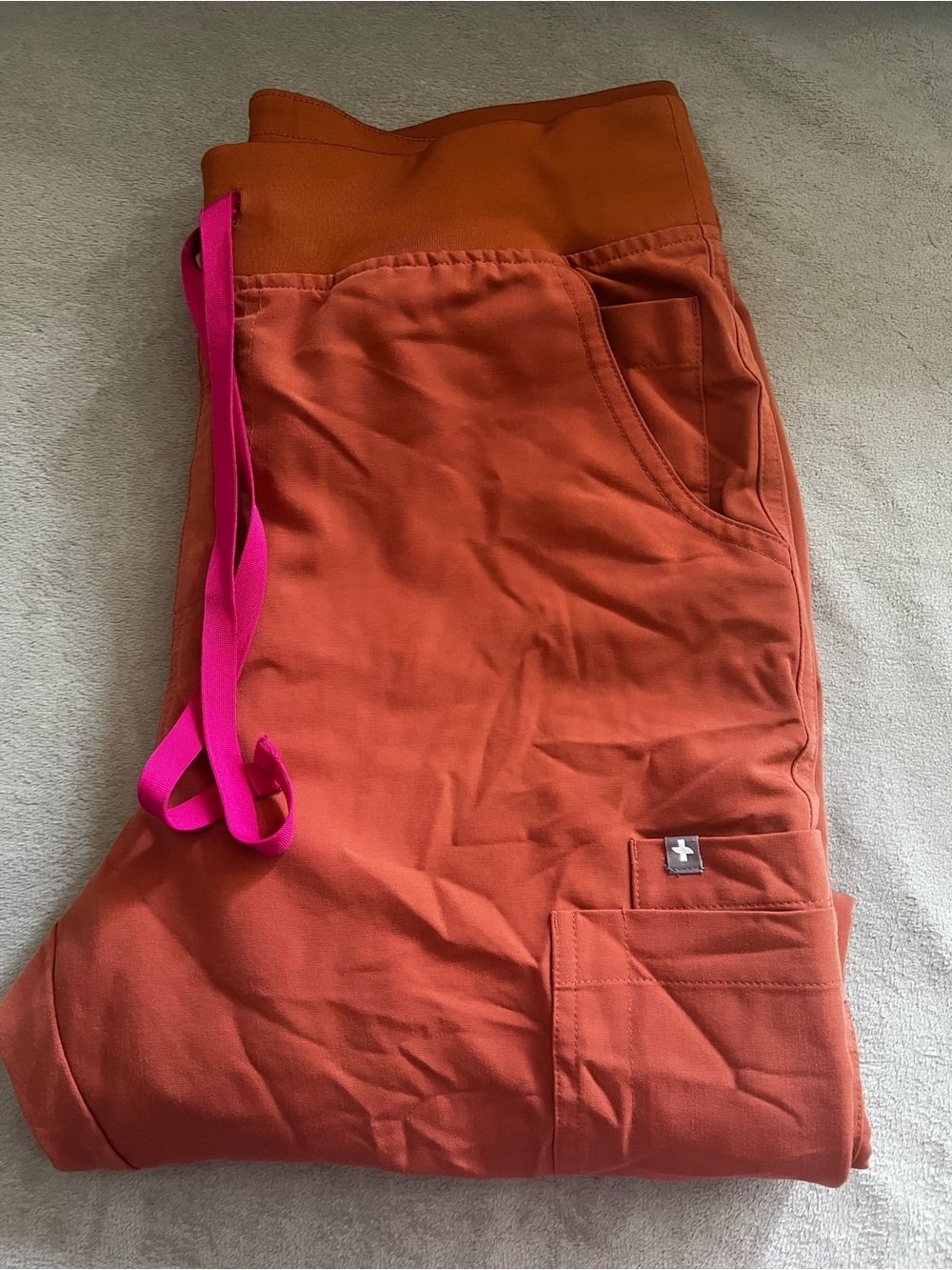 Women’s Figs Straight Orange Cargo Scrub Pants with Pocket Tab - Picture 2 of 3